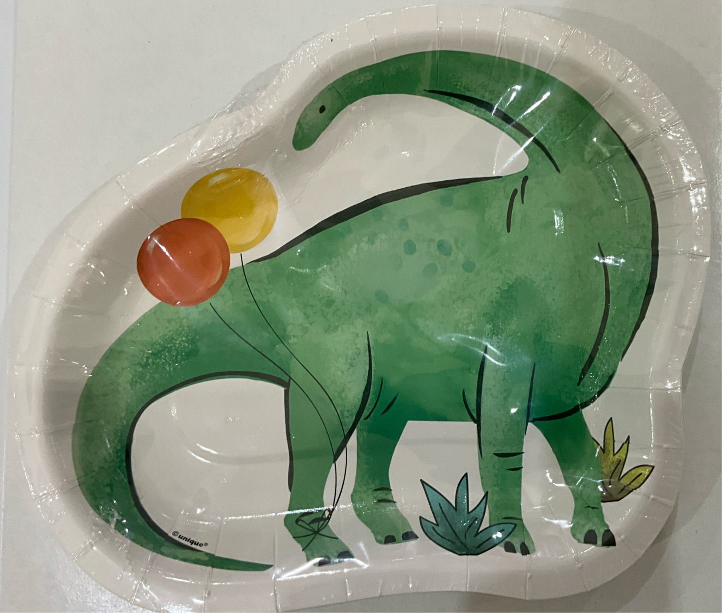 PARTYING DINOSAUR SHAPED PLATE